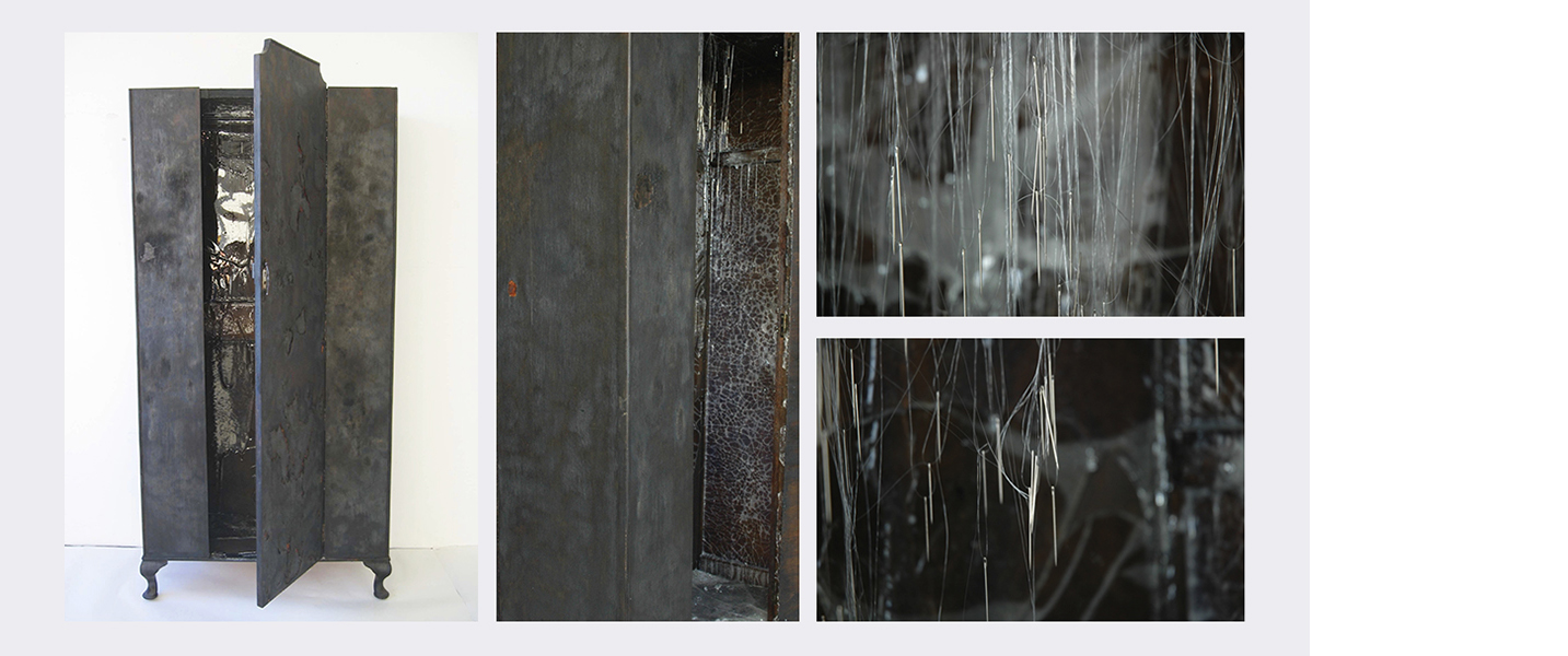 Clotho  (2006)   (92cm (w) x 146cm (d) x 203cm (h))   Burnt wardrobe  /  glass wax  /  1000 sewing needles  /  invisible thread.