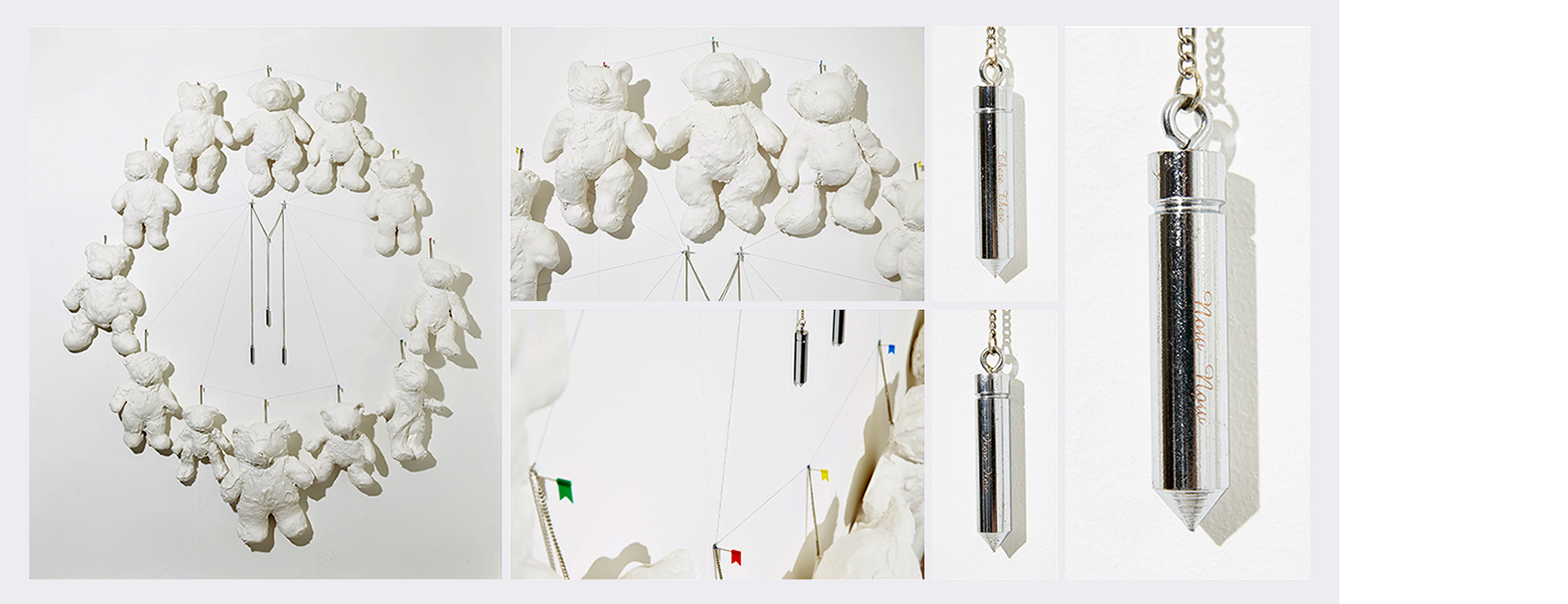 Here Here There There Now Now   /  That Was Then This Is Now  (2014)   (195cm x 168cm)   Teddy bears  /  plaster of Paris  /  engraved plumb weights  / mapping pins  /  thread  / chain.